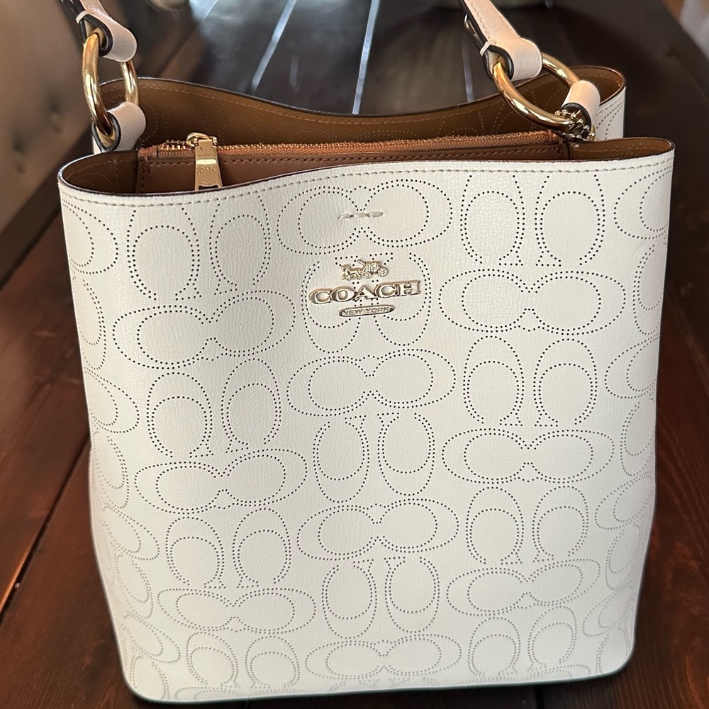 RARE FIND 
Coach Town Bucket Bag with Signature Perforated Leather